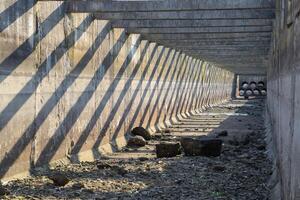 inside view of the irrigation artificial concrete channel. photo