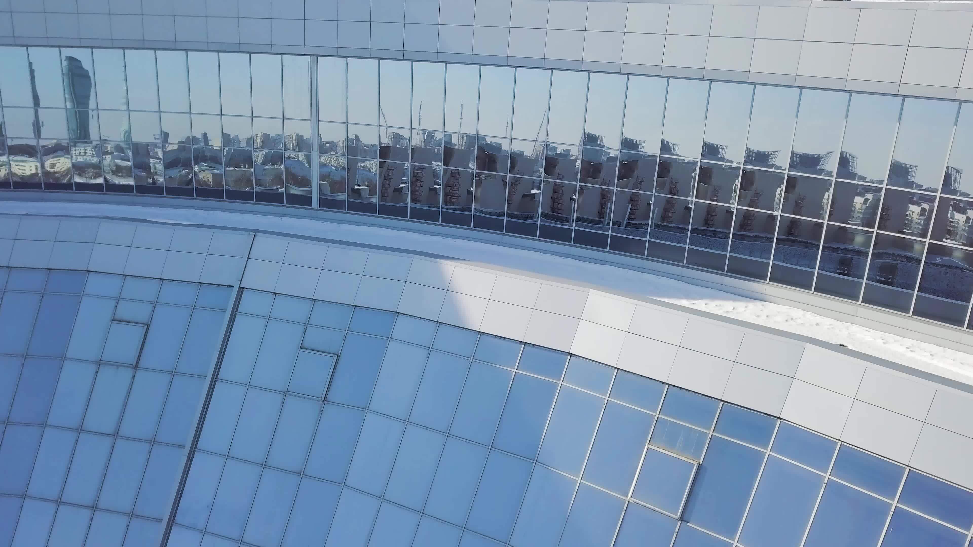 Office building windows background. Buildings reflected in windows of