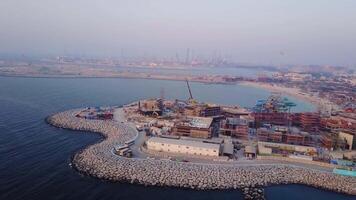 Aerial view of Dubai seaport United Arab Emirates . Top view of the construction of a water port in Dubai video