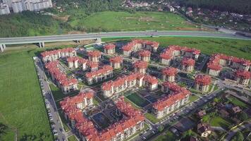 Aerial view apartment buildings complex and residential houses neighborhood. Clip. Top view of the modern luxery residential complex video