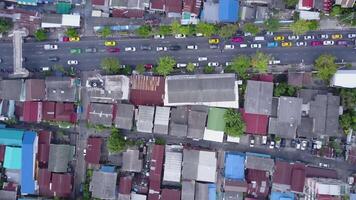 Nice view from the top of houses with tiled roofs. Top view of modern and old houses of the city. Cityscape of town and city from top view. Old and modern architecture of different styles. Authentic video