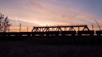 Bridge road. Train traffic transportation. Timelapse railway bridge on sunrise video