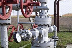 Shut-off valves on the high-pressure well flowing equipment. Oil equipment photo