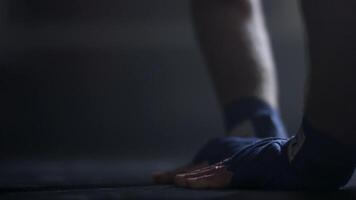 Male hands doing pushups on the floor at gym close up. Close up view of boxer doing push ups in boxing ring video