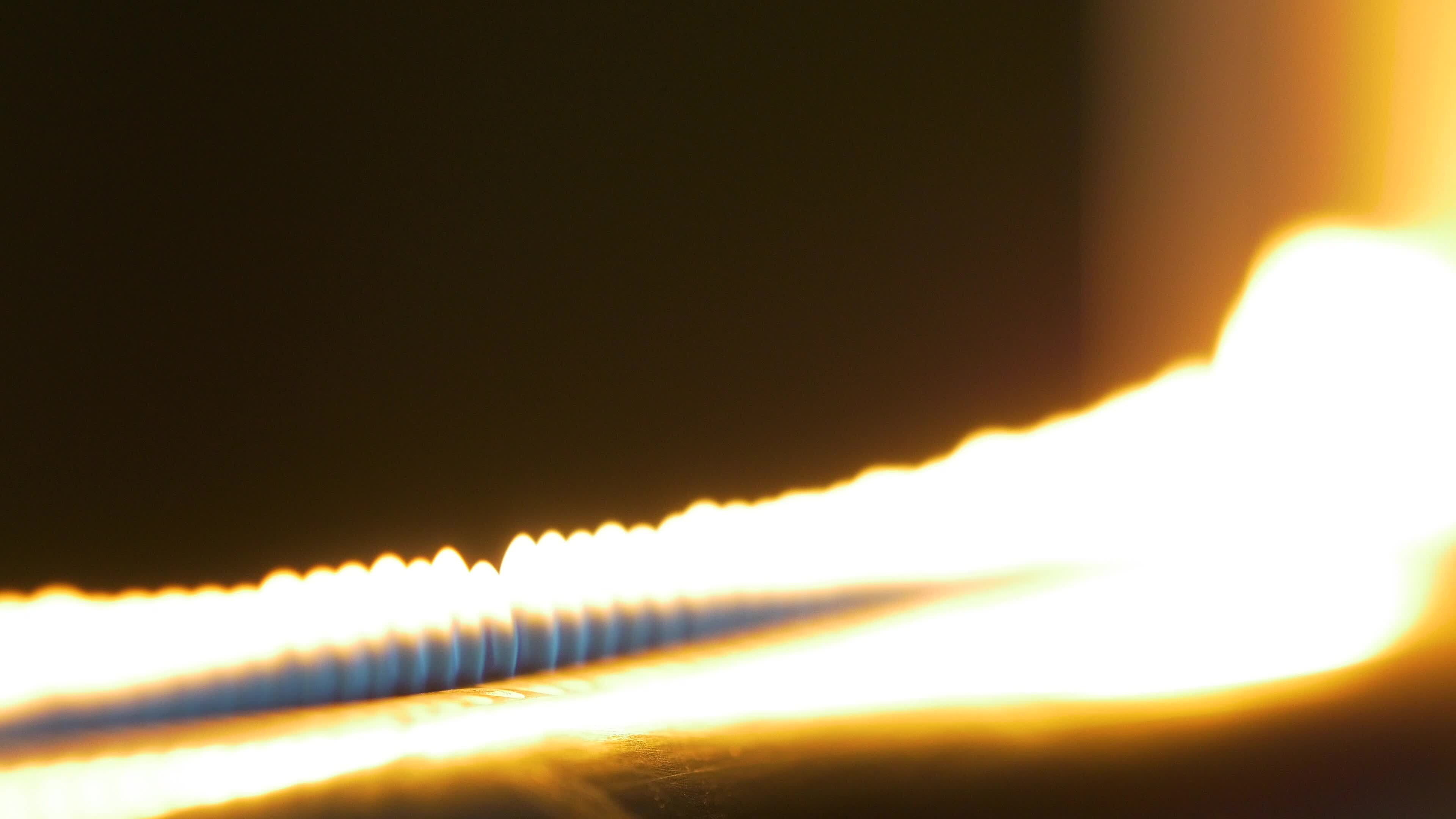 Pipe with fire in the chemistry laboratory close up. Gas system in the
