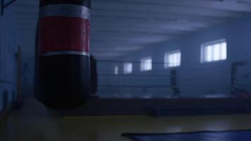 Interior of a fitness hall with a punching bag. Punching bag in the hall video