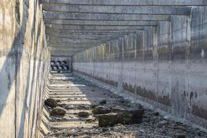 inside view of the irrigation artificial concrete channel. photo