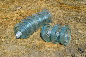 High-voltage insulators of glass insulators. Installation of high-voltage power lines photo