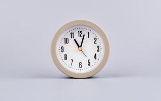 Time and work in daily life Photo of a modern clock in a high quality photo studio.