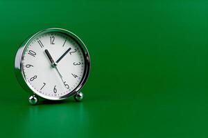 Time and work in daily life Photo of a modern clock in a high quality photo studio.