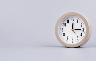 Time and work in daily life Photo of a modern clock in a high quality photo studio.