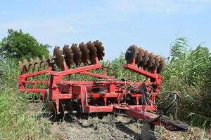 Disk harrow. Agricultural machinery photo