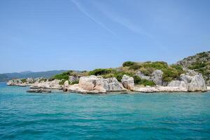 restos de el antiguo ciudad de kekova en el costa. foto