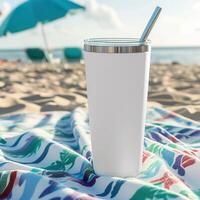 AI generated Beach Essentials, Blank White Tumbler on Sandy Towel photo