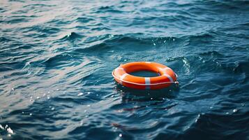 AI generated Water Safety, Orange Lifebuoy Floating in the Blue Sea photo