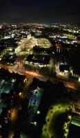 aéreo panorámico ver de iluminado Northampton ciudad de Inglaterra, Reino Unido durante noche de octubre 25, 2023 foto