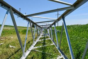 Assembly and installation of new support of a power line photo