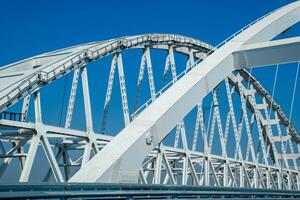 The navigable arch of the Crimean bridge. Arch of the highway and railway section of the Crimean bridge. photo