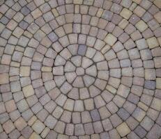 Background texture of paving slabs in circles photo