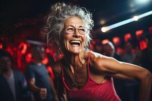 AI generated Mature elderly woman pensioner smiling happily doing boxing lifestyle for health in gym. photo