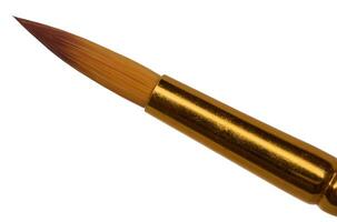 Art brush for oil paints with brown bristles on an isolated background photo