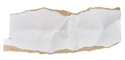 White piece of cardboard with torn edges on isolated background photo