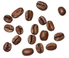 Roasted coffee beans scattered on isolated background photo