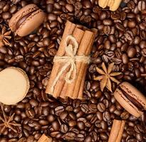 Roasted coffee beans, cinnamon sticks and star anise photo