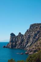 The sea coast of the Crimea, the village of Novy Svet near Sudak. Summer sea landscape. Travelling, hiking concept. Beautiful destination for vacation. High quality photo