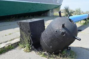 Black Underwater mine trap. Open air museum. photo