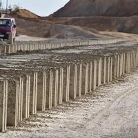 Cinder blocks lie on the ground and dried. on cinder block production plant. photo