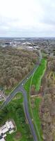 aéreo panorámico ver de corby pueblo de Inglaterra unido Reino durante nublado y lluvioso clima de invierno. enero 11, 2024 foto