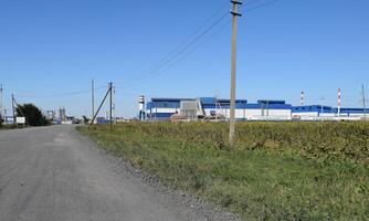 Access road to the big plant for processing scrap metal photo