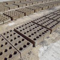 Cinder blocks lie on the ground and dried. on cinder block production plant. photo