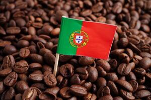 Portugal flag on coffee beans, shopping online for export or import food product. photo