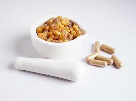 Frankincense or olibanum aromatic resin used in incense and perfumes. photo