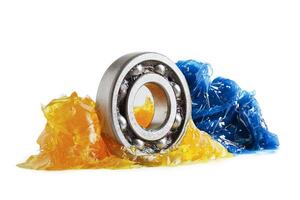 Grease and ball bearing  isolated on white background with clipping path, lithium machinery lubrication for automotive and industrial. photo