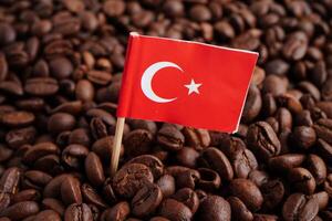 Turkey flag on coffee beans, shopping online for export or import food product. photo