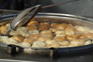 Traditional Turkish fried sweet pastry street food photo