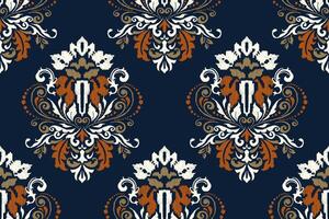 Damask Ikat floral seamless pattern on navy bluebackground vector illustration.Ikat ethnic oriental embroidery,Aztec style,abstract background.design for texture,fabric,clothing,wrapping,decoration.