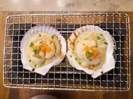 Grilled Scallops with Butter and crab fat. japanese food photo