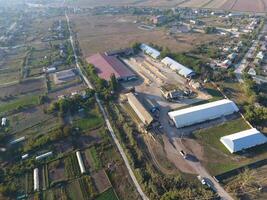 Hangar for storage of grain. A platform for drying and sintering grain. Harvested grain photo