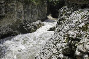 The mountain river in the gorge. photo