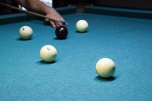 Billiards, billiard table. Targeting the cue in the ball for imp photo