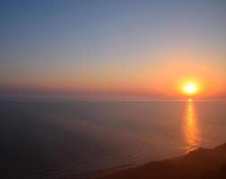 Dawn over the sea. Sea of Azov. Sunrise. photo