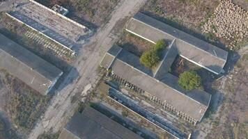 The building of an old farm for cattle. Top view of the farm. Storage of bales of hay on the old farm photo