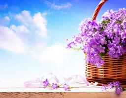 bluebells spring flowers in a basket photo