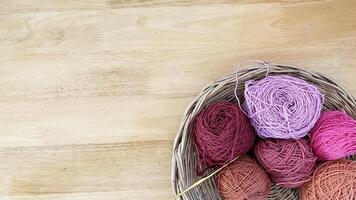 The colorful cotton yarn, ball of threads, wool. Handmade crocheting crafts. DIY concept. Copy space photo