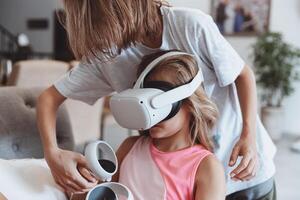 Brother and Sister Playing Video Game photo