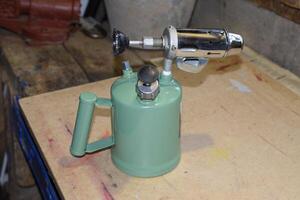 Blowtorch, general view. Blowtorch a with a green tank photo